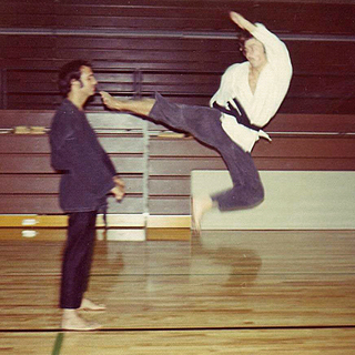 John performing Flying Side Kick